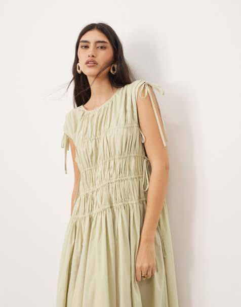 Vestido midi verde salvia lavado de corte trapecio depurado con bolsillos y detalle de cordón ajustable de algodón de ARRANGE - view 1
