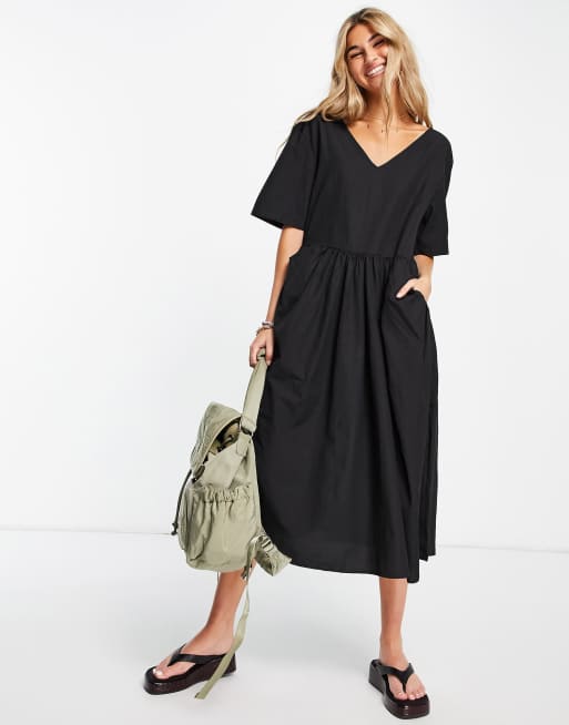 Vestido negro amplio con cuello de pico y bolsillo de Bolongaro Trevor