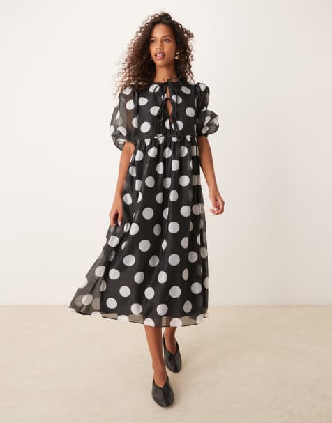 Vestido negro amplio con estampado de lunares blancos y mangas abullonadas de Glamorous - view 1