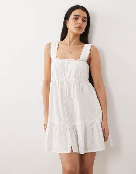 Vestido playero corto blanco con botones de Iisla & Bird - view 1