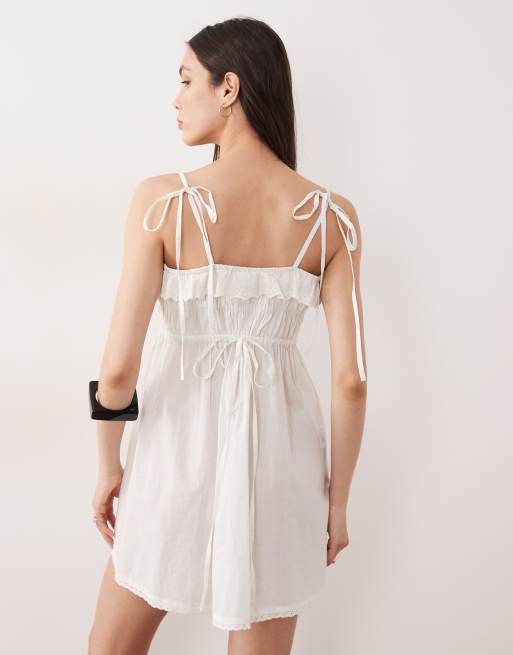 Vestido playero corto blanco semitransparente con ribete bordado de Aray, 2 de 4