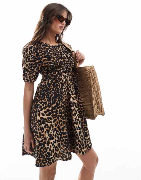Vestido playero corto con estampado de leopardo, mangas abullonadas y lazada delantera exclusivo de Esmée - view 1