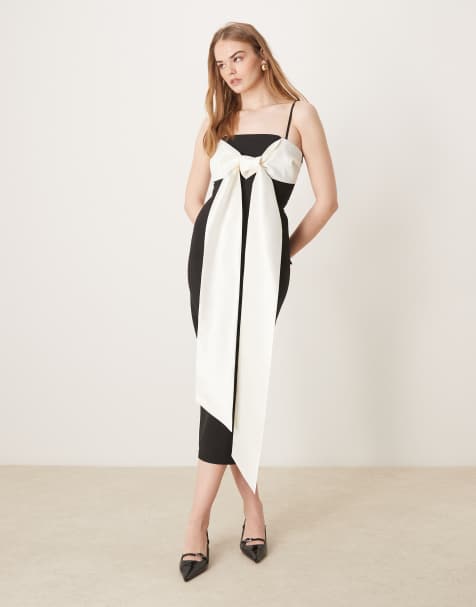 Vestido semilargo negro con lazo color crema extragrande en contraste de Pretty Lavish - view 1
