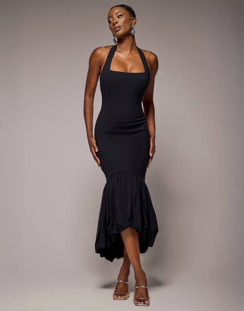Vestido semilargo negro de corte sirena con cuello halter y bajo abullonado de Goddiva - view 1