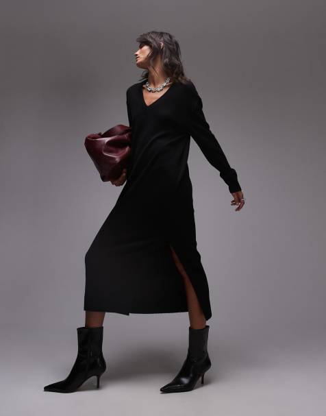 Vestido semilargo negro extragrande con aberturas laterales de punto de ARKET - view 1