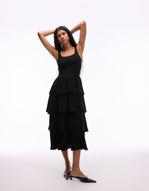 Vestido semilargo negro sin mangas con volantes vaporosos de mezcla de tejido liso y de punto de canalé de & Other Stories - view 1