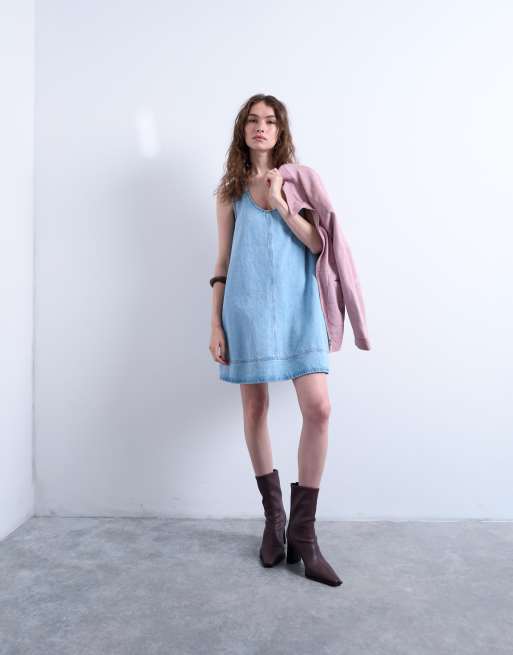 Vestido vaquero con vuelo y lavado descolorido de Topshop