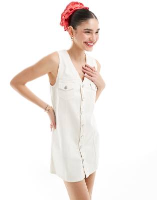 Vestido vaquero corto color crudo estilo chaleco con botones de ASOS DESIGN