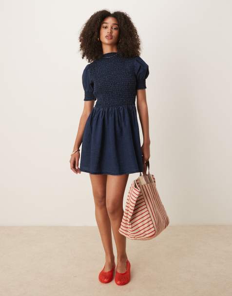 Vestido vaquero corto con acabado enjuagado, parte delantera fruncida y mangas abullonadas de ASOS DESIGN - view 1