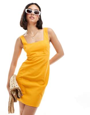 Vestido veraniego corto color mango con escote cuadrado y lazada en la espalda de ASOS DESIGN