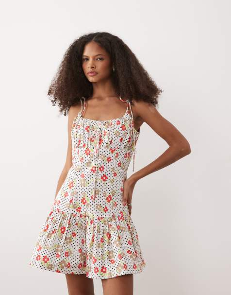 Vestido veraniego corto rojo con estampado de flores y lunares pequeños, cintura baja y lazada en el pecho de satén de algodón de ASOS DESIGN - view 1