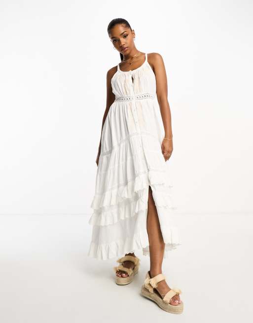 Vestido veraniego largo color crudo para festivales con bordados y volantes de Miss Selfridge 