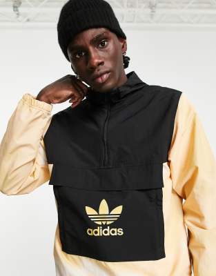 фото Ветровка с кремовым камуфляжным принтом adidas originals-синий