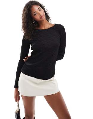 3D textured long sleeve top in black