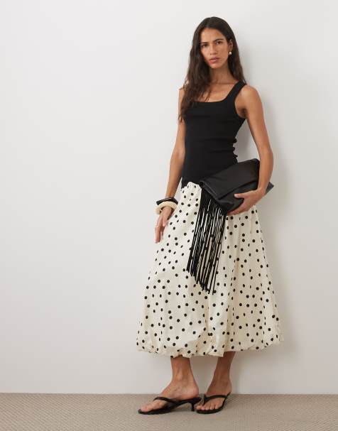 VILA balloon hem midi skirt in white and black polka dot print - view 1