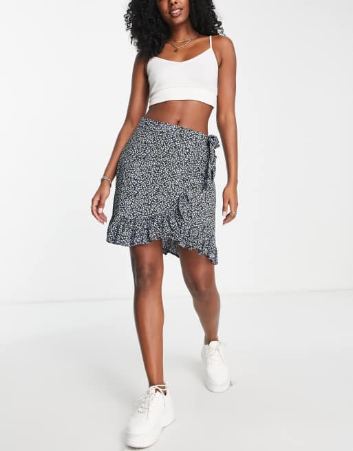 Vila – Blommig minikjol i omlottdesign, 4 av 4