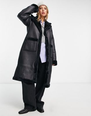 Vila longline faux shearling lined coat in black - ASOS Price Checker