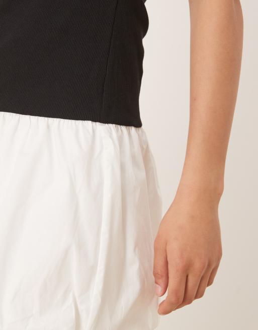 VILA contrast puffball hem mini dress in black and white