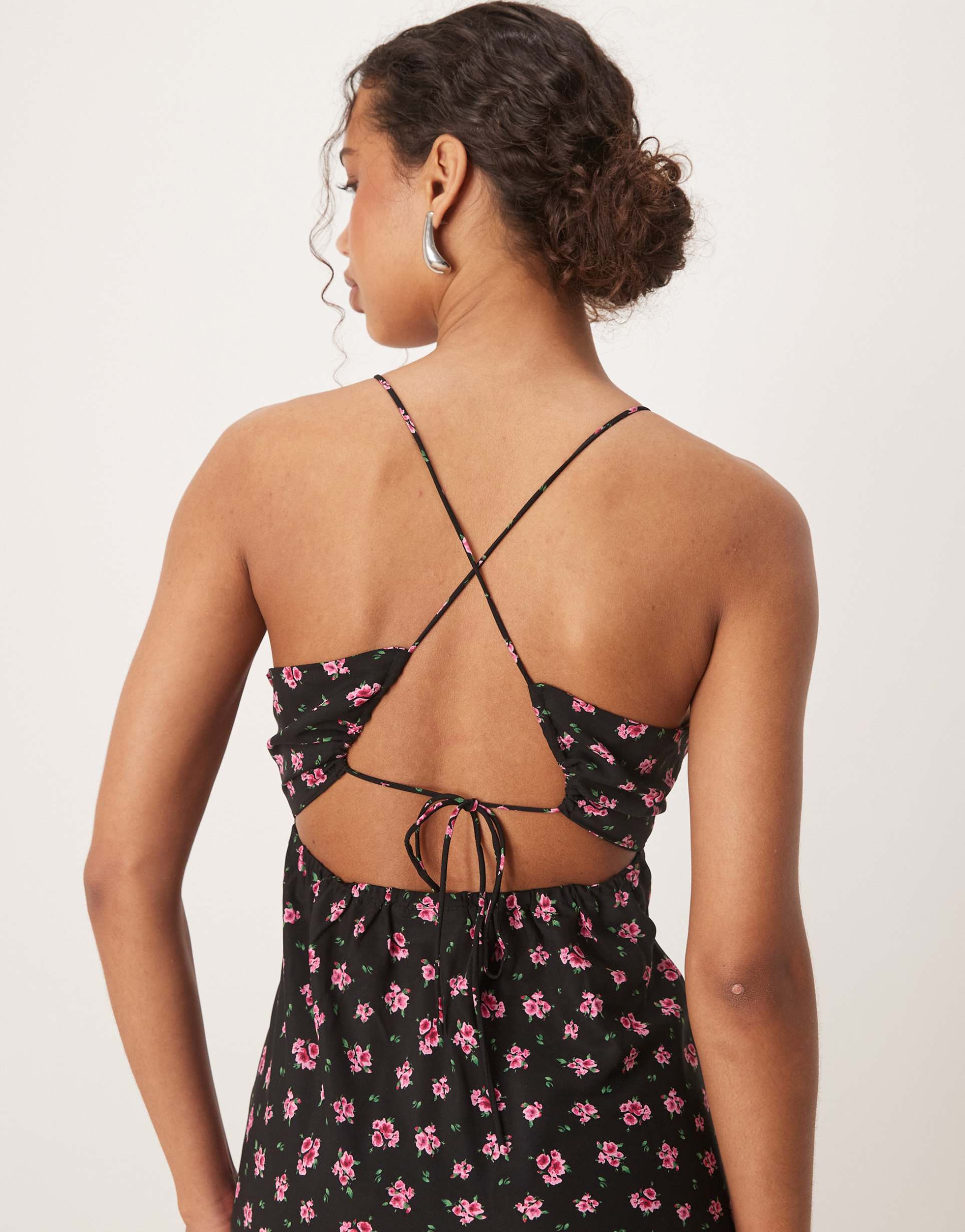 vila cross back detail maxi slip dress in black and pink floral print