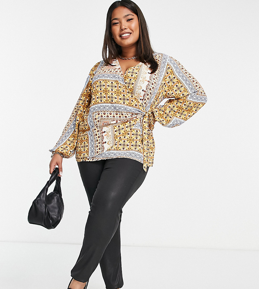 Plus-size top by Vila Your new go-to All-over tile print Wrap front Blouson sleeves Tie waist Regular fit