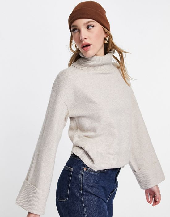 https://images.asos-media.com/products/vila-fluffy-knit-sweater-with-roll-neck-and-deep-cuffs-in-cream/201220614-2?$n_550w$&wid=550&fit=constrain
