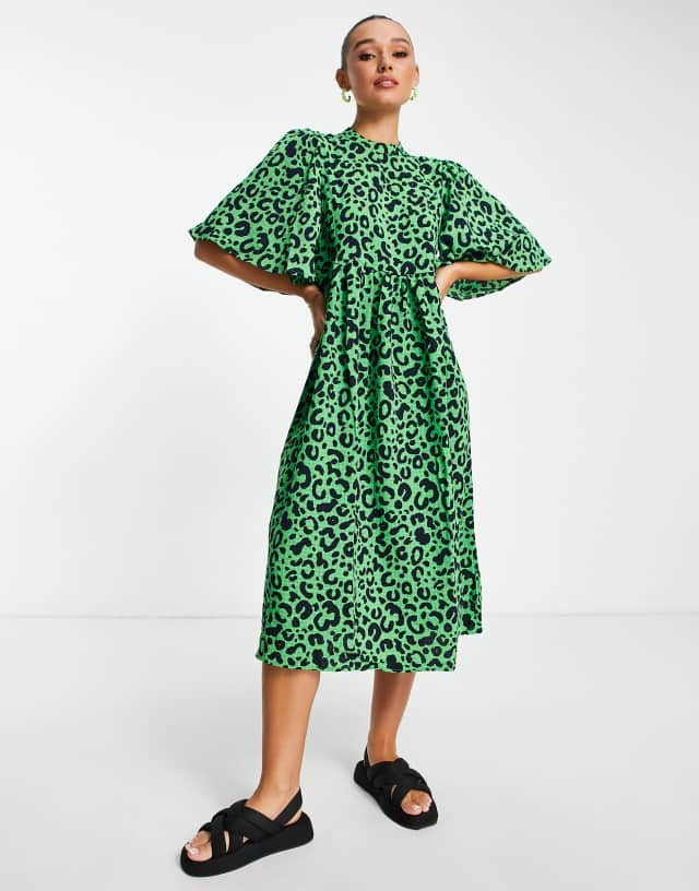 Vila flutter sleeve midi dress in green animal print