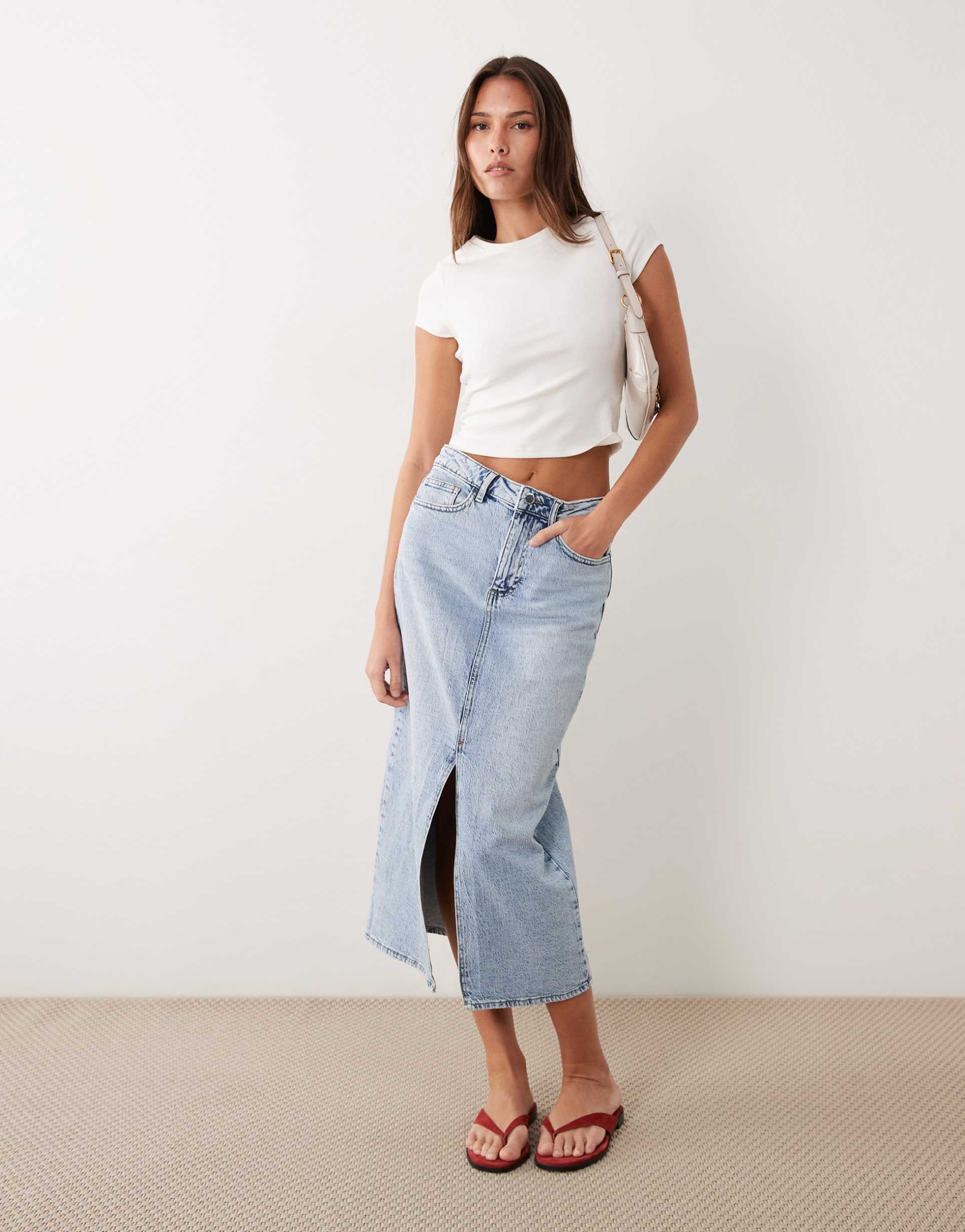 vila high waisted denim front split midi skirt in light blue