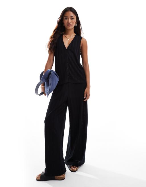 Vila lightweight knit sleeveless vest and wide leg pants set in black