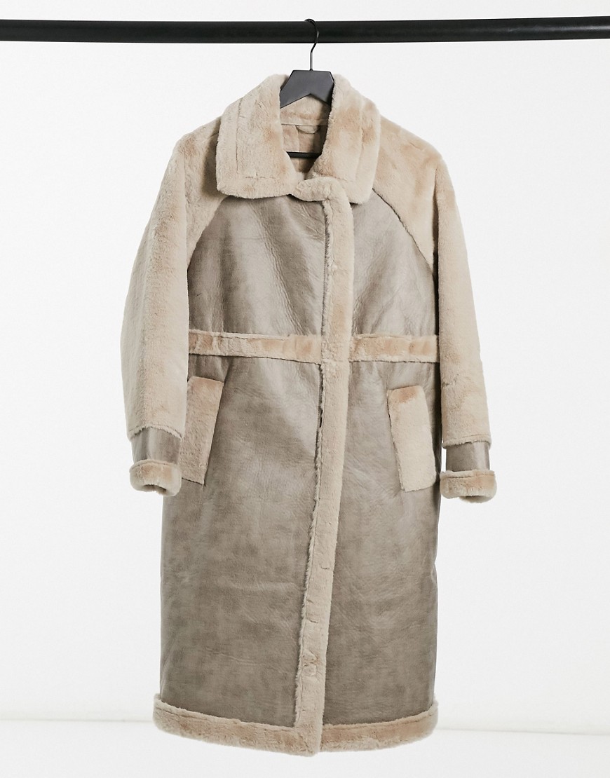 Vila longline faux fur coat with panelled detail in beige-Neutral
