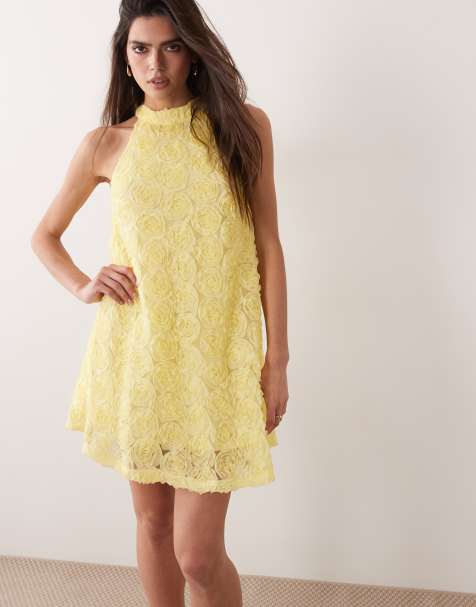VILA – Neckholder-Minikleid aus geblümtem Jacquard in Pastellgelb - view 1