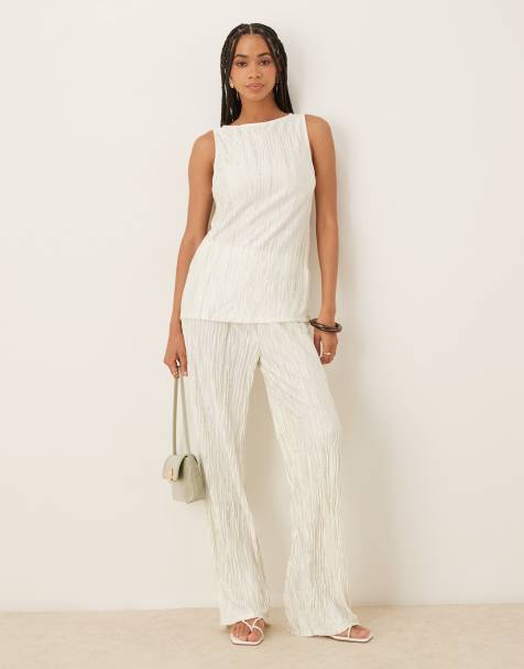 Vila plisse slash neck sleeveless top and high waisted wide leg trousers set in pale silt green tie dye - view 1