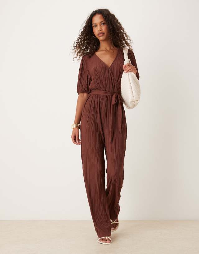 VILA plisse wrap front jumpsuit in chocolate brown | ASOS