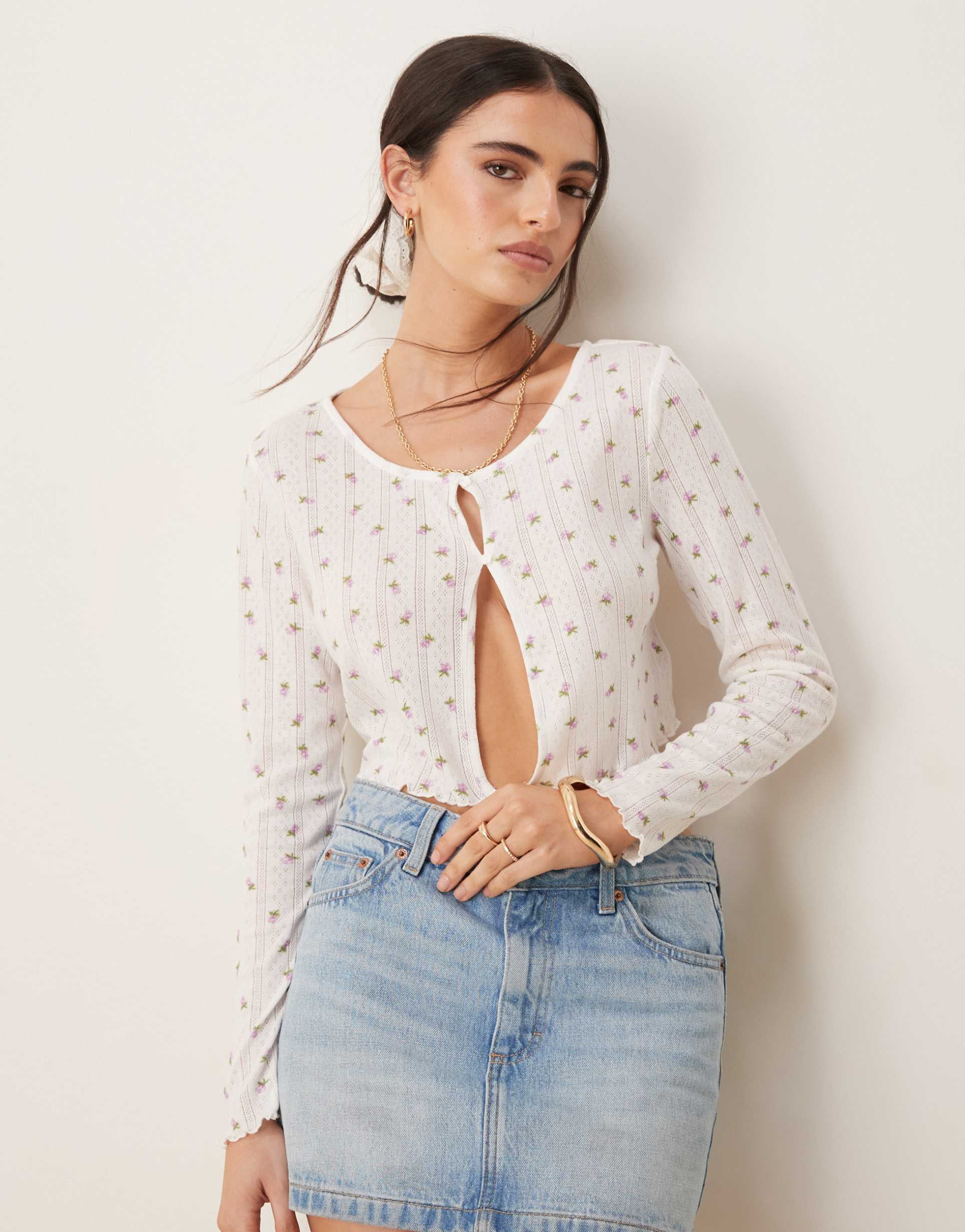 vila pointelle button front cardigan in pink delicate floral