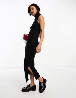 ribbed high neck sleeveless top in black - part of a set
