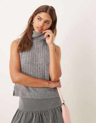 ribbed high neck sleevless knit vest in dark gray