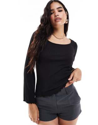 Vila ribbed long sleeve scoop neck top with lettuce edge detail in