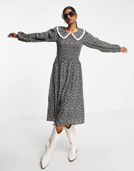 Vila - Robe babydoll mi-longue à imprimé fleuri avec manches longues et col fantaisie - Noir