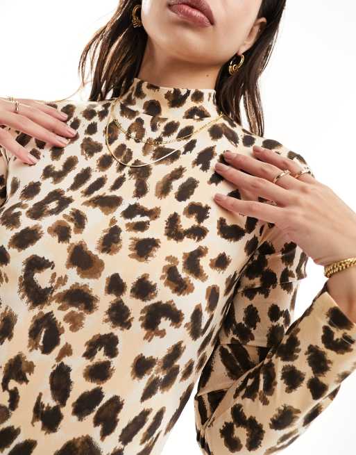 Leopard print roll neck sale