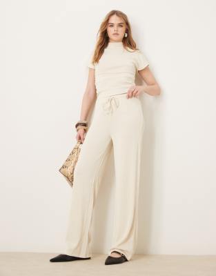 stretch wide leg pants in cream - part of a set-White