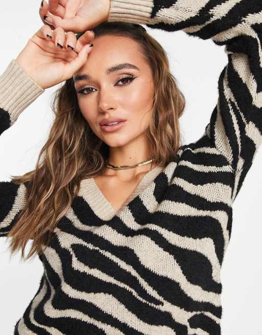 Animal print v hot sale neck sweater