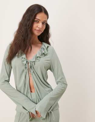 textured ruffle tie front jersey top in milieu green - part of a set