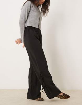 wide leg pants with side split and tie side detail in black