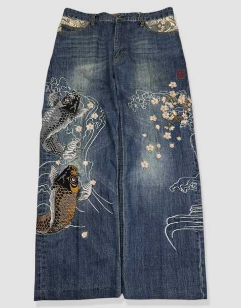 Vintage 34W 28L Karakuri Tamashii Japanese embroidered baggy jeans in blue - view 1