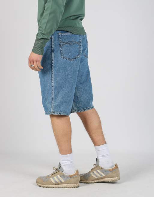 Vintage  36x25 denim jorts shorts in light blue