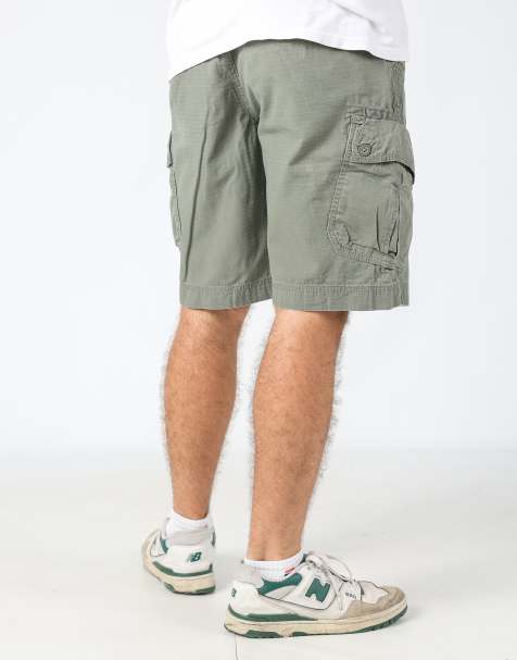 Vintage Calvin Klein 32x22 canvas cargo shorts in dark green - view 1