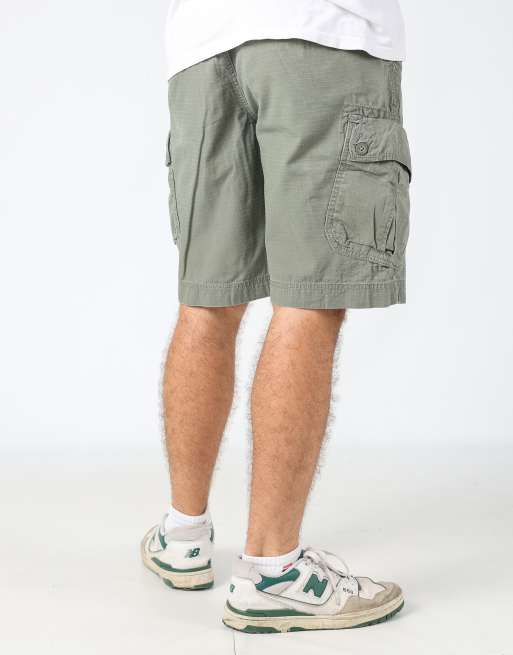 Vintage Calvin Klein 32x22 canvas cargo shorts in dark green