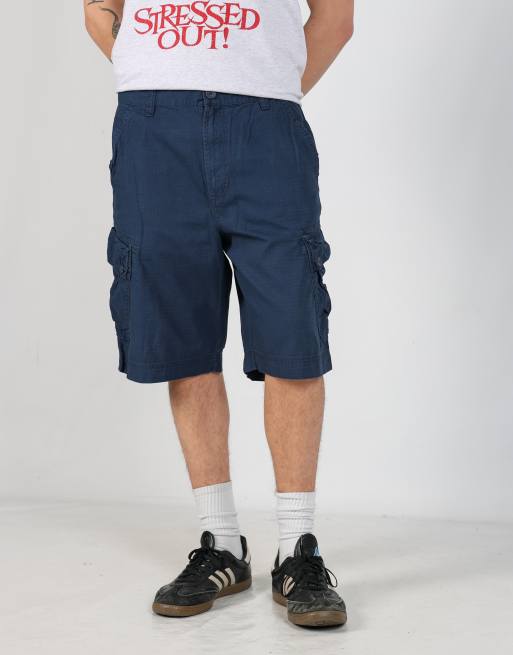 Vintage Calvin Klein 34x22 canvas cargo shorts in navy blue