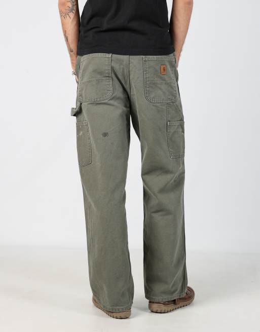 Vintage Carhartt 34x30 denim carpenter jeans in khaki green
