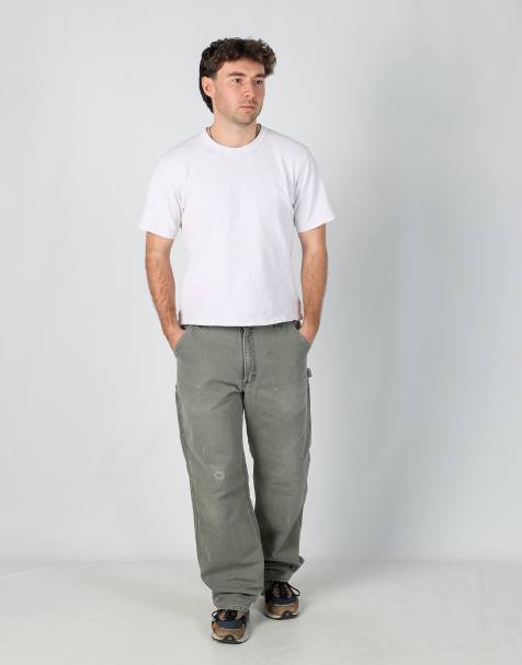 Vintage Carhartt 34x34 canvas carpenter jeans in dark green - view 1