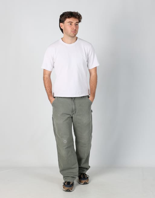 Vintage Carhartt 34x34 canvas carpenter jeans in dark green